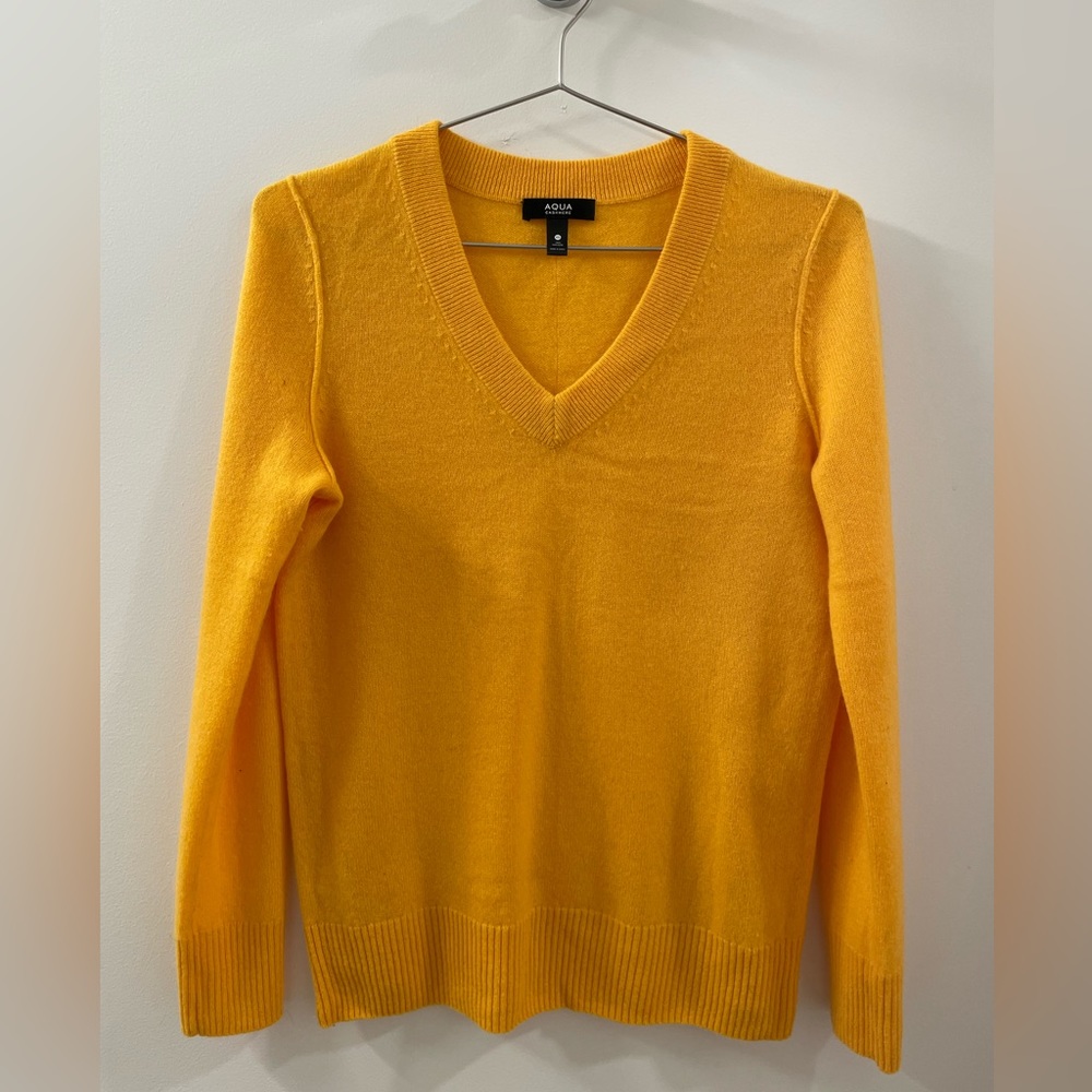 100% cashmere V-neck long sleeve. Size XS, fits like S-M. Only warn 2 times.